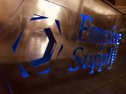 Empire Supply Co. Logo Laser Cut into Metal